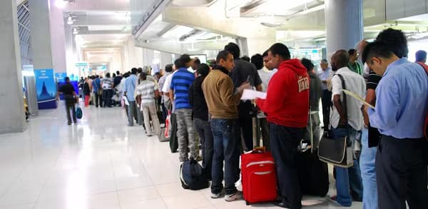 line of people queueing at an airport