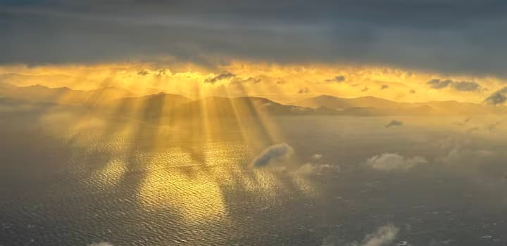 Light coming through the clouds over New Zealand