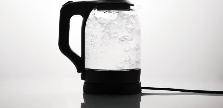 Electric glass kettle with water
