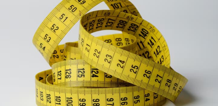 Close-Up Photo of Yellow Tape Measure