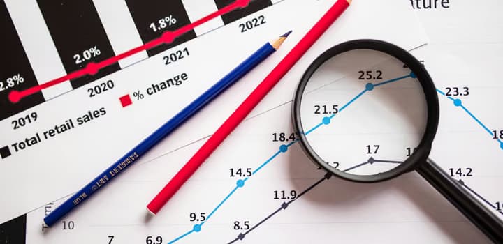 A magnifying glass on a chart